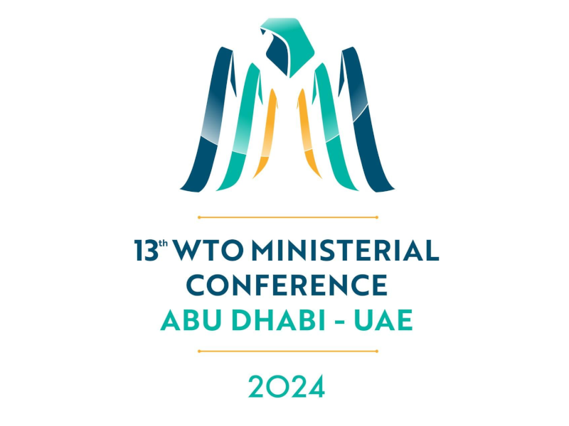 Logo displaying the 13th Ministerial Conference of the World Trade Organisation in Abu Dhabi.